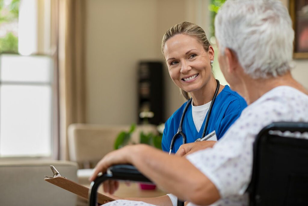 aged care nursing helping a women